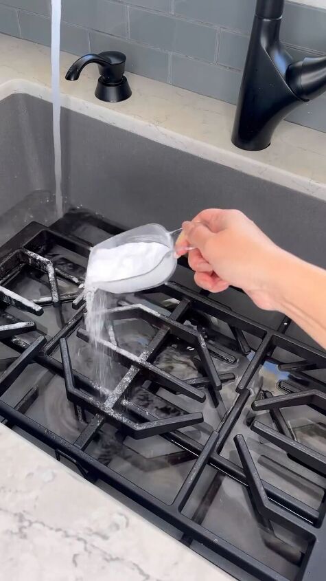 Pouring baking soda on the stove