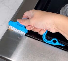 how to deep clean your gas stove, Cleaning crevices and gaps with a long thin brush