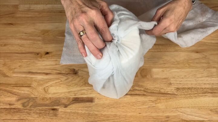 Tuck the snow roll into the toilet paper