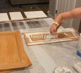 how to paint bathroom cabinets, Applying an oil based primer