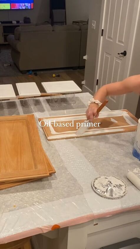how to paint bathroom cabinets, Applying an oil based primer