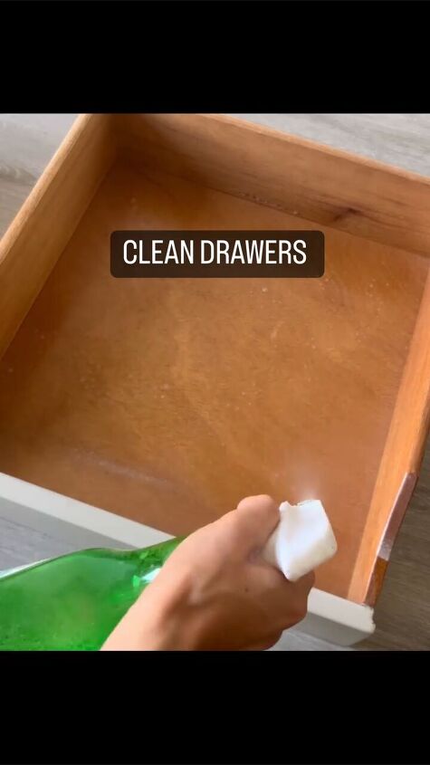 Spraying and wiping the drawers
