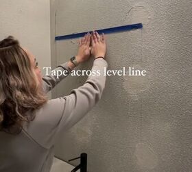 how to hang mirror on wall, Placing tape across the level line