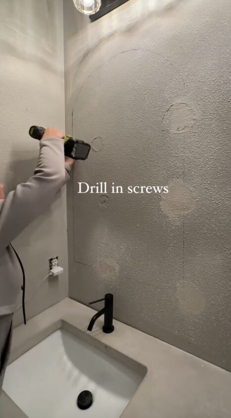 how to hang mirror on wall, Drilling in the screws