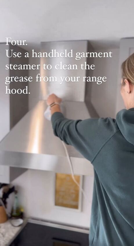 Using a garment steamer to clean a range hood