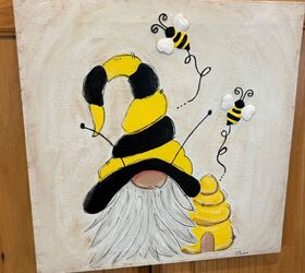 Un gnomo abeja feliz pintado sobre lienzo.