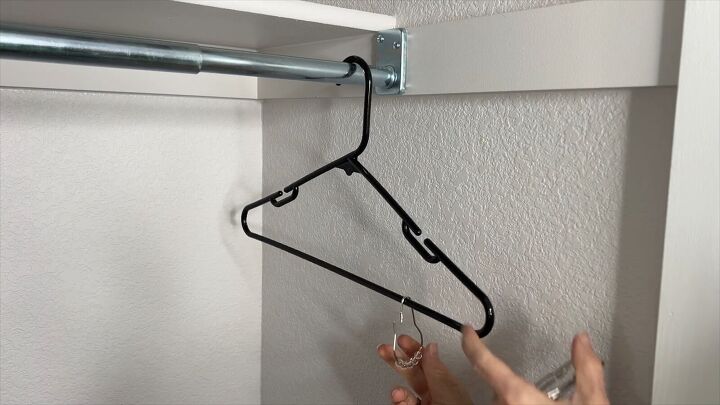 Place shower hooks on a hanger