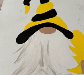 un gnomo abeja feliz pintado sobre lienzo