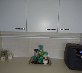 Double your countertop storage space with this 2-tension rod hack