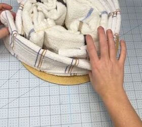 Towel cake with kitchen tools for new homes