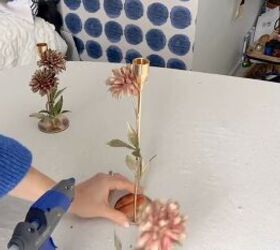 Unique candle holders with artificial flowers