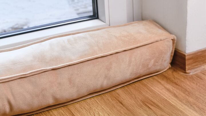how to keep a house warm without central heat, DIY draught excluder