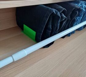 She puts a tension rod into her closet for an easy and brilliant storage idea