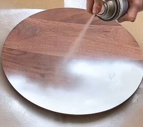 Spray-painting the wood round