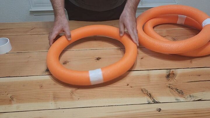 Form a ring with the pool noodle