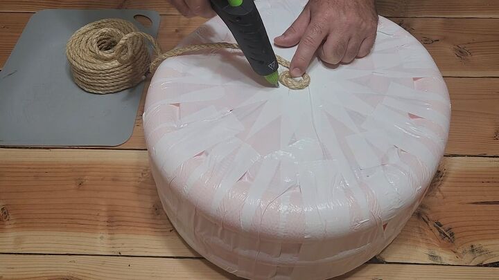 Wrapping rope around the ottoman