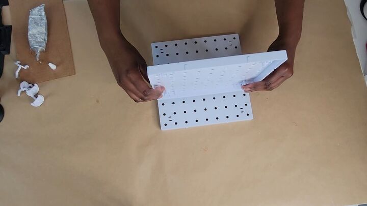 Homemade pegboard jewelry holder
