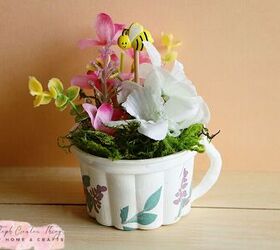 cmo transformar copas de helado arreglos florales primaverales con tazas de t, Floral en un expositor de tazas de t