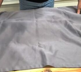 Laying the fabric out on a flat surface
