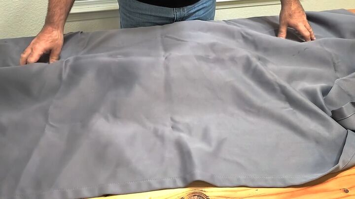 Laying the fabric out on a flat surface