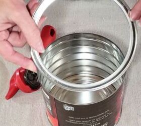 She cuts the rim off a coffee can for this wild upcycle idea