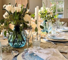 concha de ostra, Elegante mesa con centro de mesa floral y vajilla fina en una habitaci n c lidamente iluminada