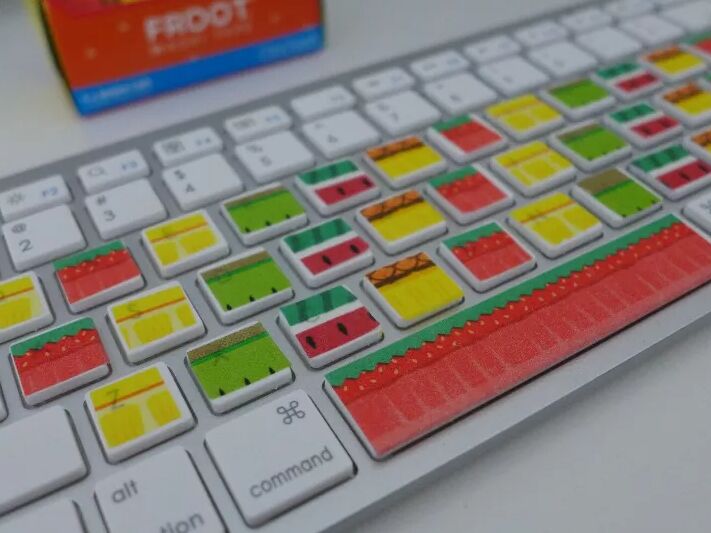 Keyboard decorated with fruit-themed washi tape