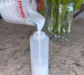 Decanting the DIY baking soda cream cleaner into a bottle