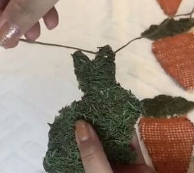 Threading the ornaments onto twine