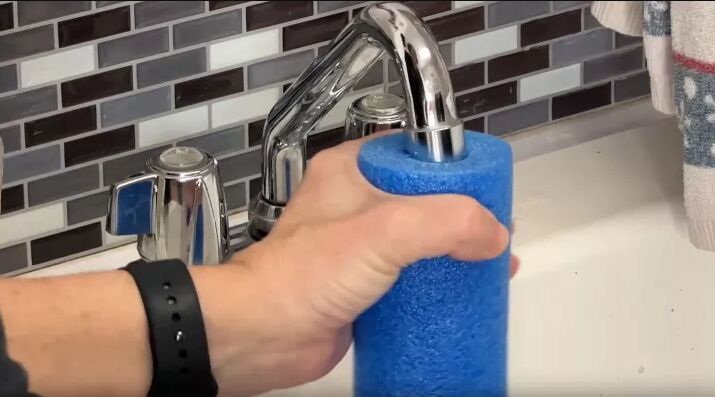 Attaching the pool noodle to the faucet by Chas' Crazy Creations