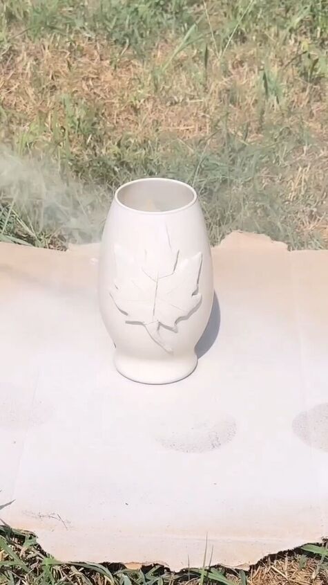 Applying a base coat of spray paint