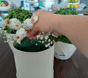 Arranging flowers and chocolate truffles