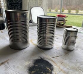 She pokes a hole in the tops of 3 cans for this beautiful backyard idea