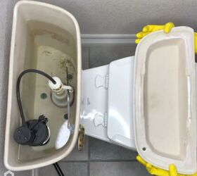 how to fix a running toilet, Open toilet tank