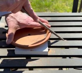 Filing notches in the terracotta saucer rim