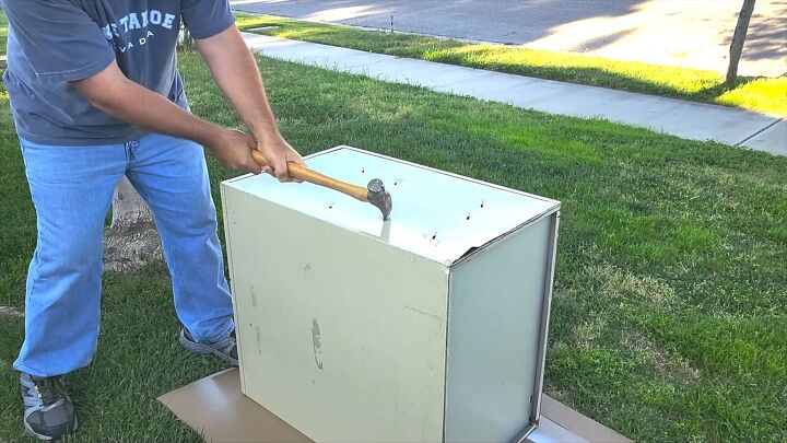 Add drain holes to your filing cabinet for proper water flow