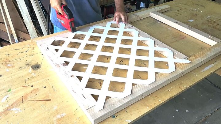 Securing the trellis to the cabinet