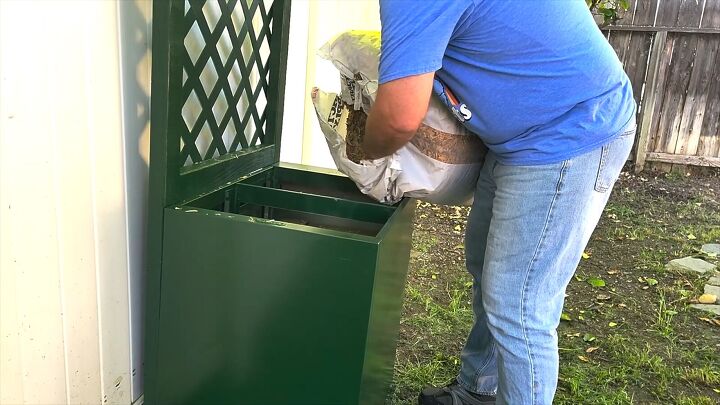 Adding pine shavings to the cabinet