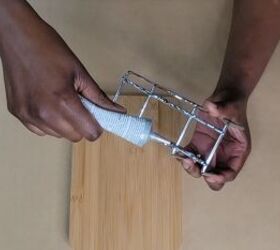 Applying glue to the metal bars of a napkin holder