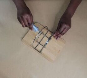 Applying glue to the sides of the napkin holder