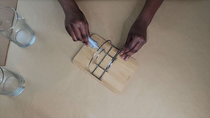 Applying glue to the sides of the napkin holder