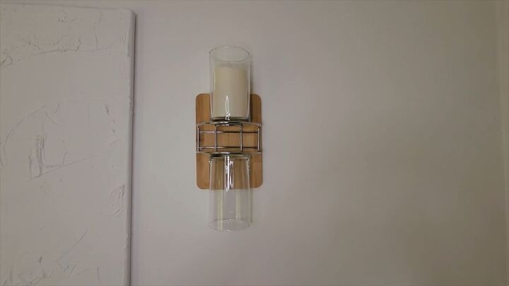Battery-operated candle placed inside the top jar