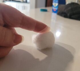 Rubbing Vicks on a cotton ball
