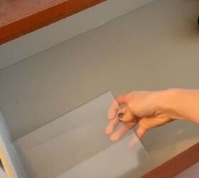 She lays empty picture frames in her drawer for the smartest hack we've seen all week