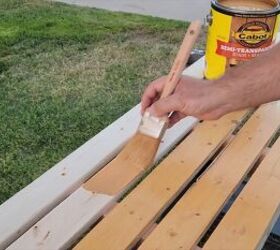 Applying Cabot Semi-Transparent Stain & Sealer to the bench.