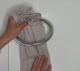 Fold the curtain like a fan or an accordion to add some style before hanging