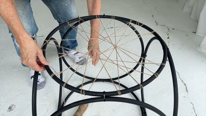 Wrapping the twine to create a spiderweb effect