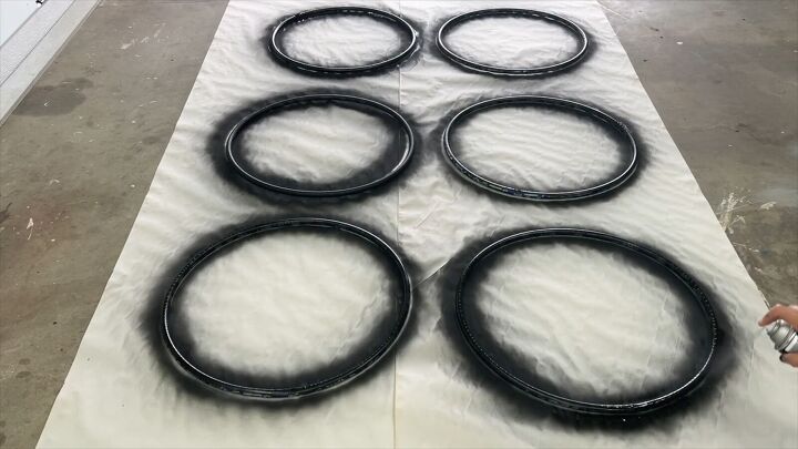 Spray paint the hula hoops