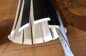 She cuts up a take-away coffee cup for this pretty decor idea