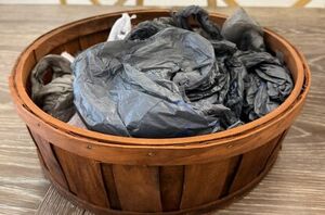 Stuff shopping bags in a basket for this stunning summer idea